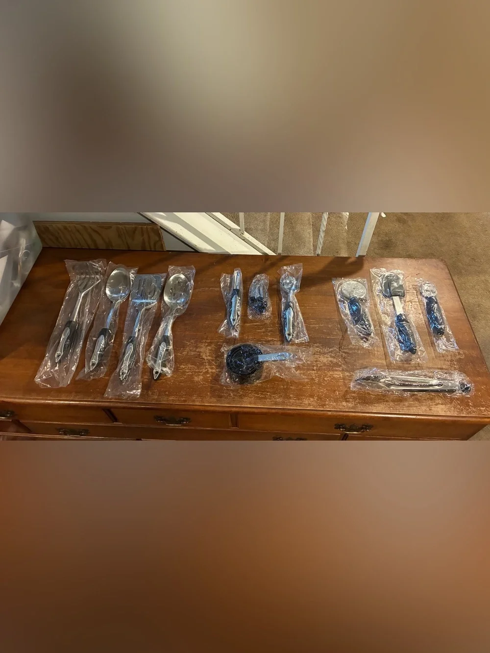 Stainless Steel Kitchen Utensil Set with Black Handles - 12 Piece. New. $9